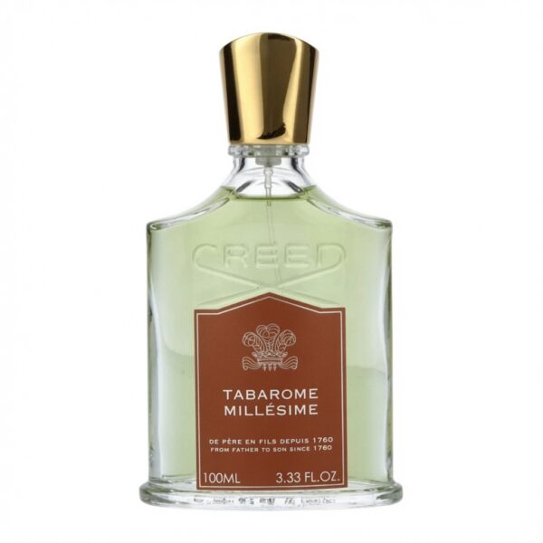 Creed Tabarome Millésime parfumfles met gouden dop, bruine label en lichte vloeistof op witte