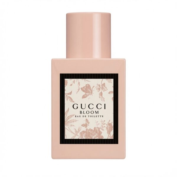 Gucci Bloom Eau de Toilette roze fles met bloemen- en vlinderlabel op witte achtergrond